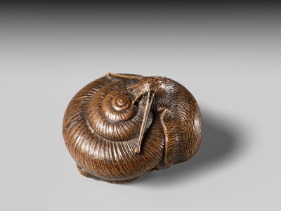 Lot 159 - TADATOSHI: A FINE NAGOYA SCHOOL WOOD NETSUKE OF A SNAIL