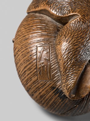 Lot 159 - TADATOSHI: A FINE NAGOYA SCHOOL WOOD NETSUKE OF A SNAIL