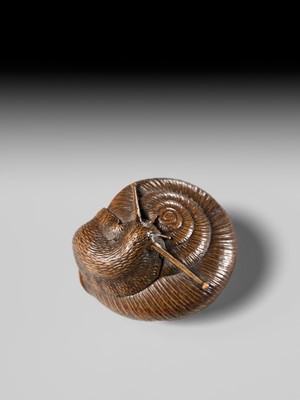 Lot 159 - TADATOSHI: A FINE NAGOYA SCHOOL WOOD NETSUKE OF A SNAIL