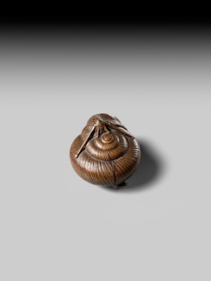 Lot 159 - TADATOSHI: A FINE NAGOYA SCHOOL WOOD NETSUKE OF A SNAIL