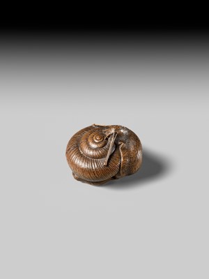 Lot 159 - TADATOSHI: A FINE NAGOYA SCHOOL WOOD NETSUKE OF A SNAIL