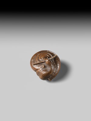 Lot 159 - TADATOSHI: A FINE NAGOYA SCHOOL WOOD NETSUKE OF A SNAIL