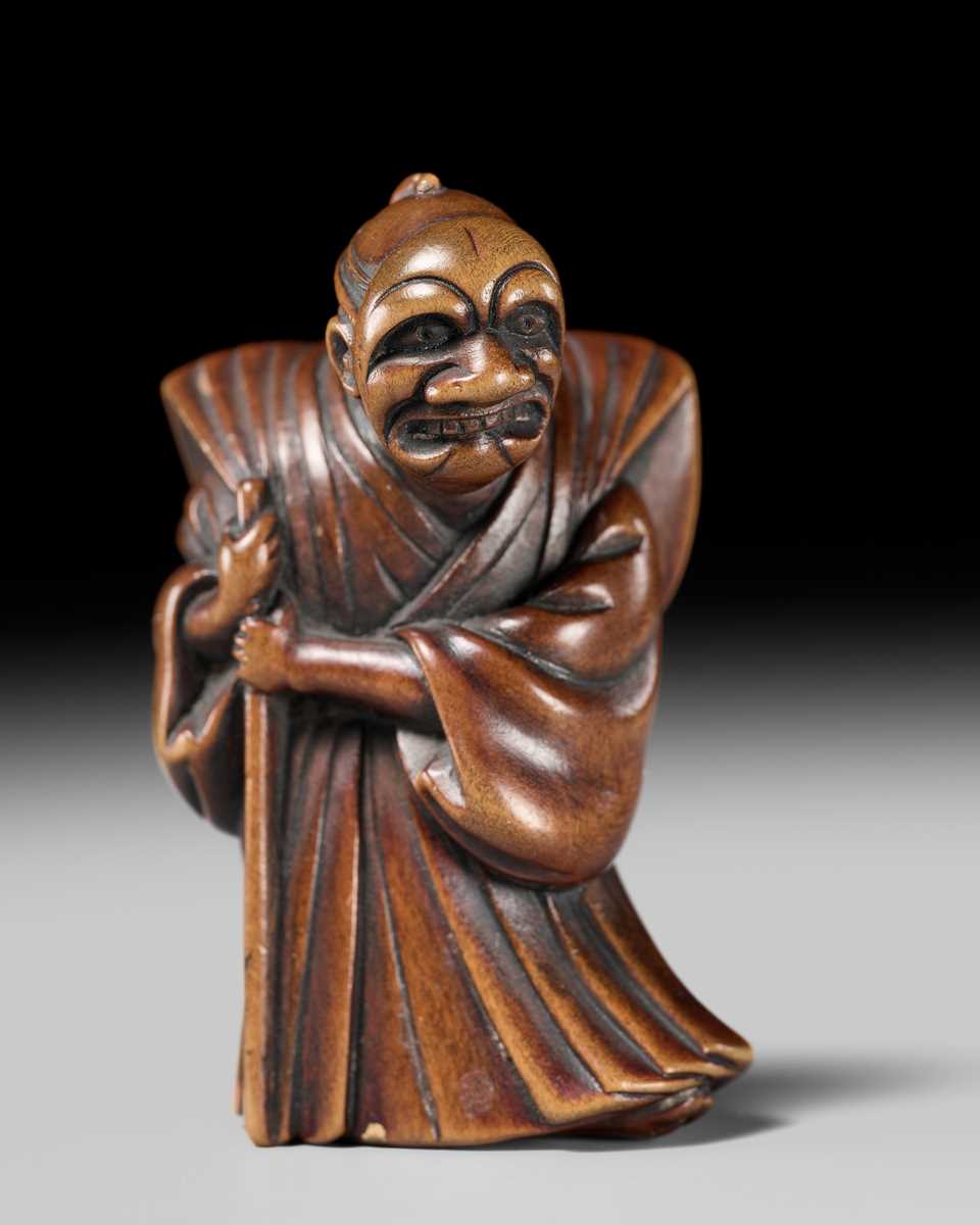 Lot 237 - MASAZANE: A FINE WOOD NETSUKE OF A BUAKU DANCER