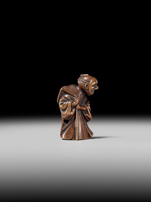 Lot 237 - MASAZANE: A FINE WOOD NETSUKE OF A BUAKU DANCER