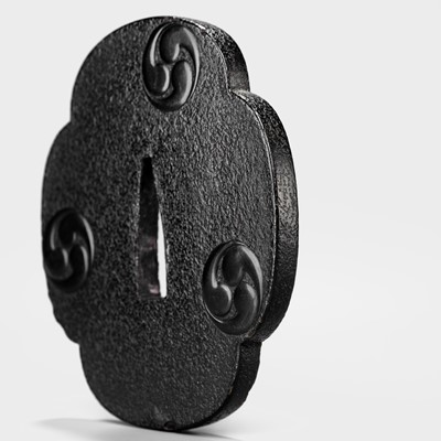 Lot 94 - A FINE LACQUERED WOOD TSUBA WITH MITSUTOMO-E MON