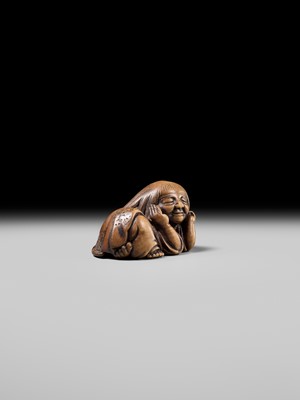 Lot 192 - YOSHIOKI: A SUPERB WOOD NETSUKE OF A SLEEPING SHOJO