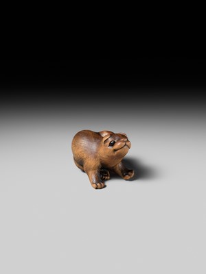 Lot 162 - NAITO TOYOMASA: A SUPERB WOOD NETSUKE OF A PUPPY SCRATCHING ITSELF