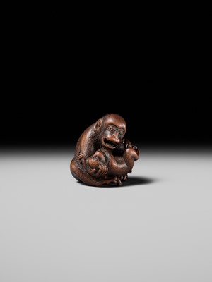 Lot 114 - MASANAO: A SUPERB WOOD NETSUKE OF A MONKEY WITH YOUNG