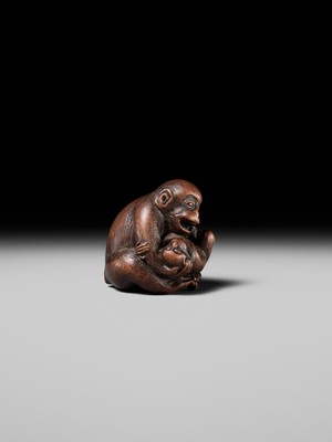 Lot 114 - MASANAO: A SUPERB WOOD NETSUKE OF A MONKEY WITH YOUNG