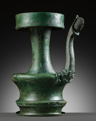 Lot 461 - A RARE BRONZE EWER WITH A MAKARA SPOUT, JAVA, 10TH-11TH CENTURY