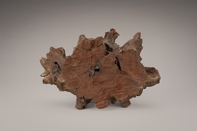 Lot 759 - AN AGAR WOOD ‘SCHOLAR’S ROCK’ WITH A SPHERE, QING