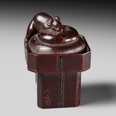 Lot 457 - MASAKIYO: A FINE WOOD NETSUKE OF A RAT ON A KAGAMI MOCHI