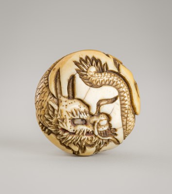 Lot 1328 - A SIGNED IVORY RYUSA MANJU NETSUKE OF A DRAGON