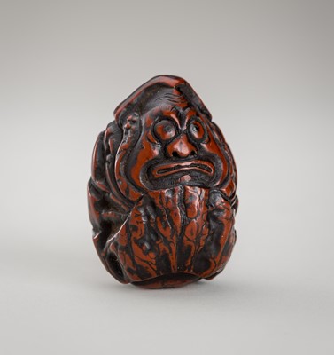 Lot 1205 - A KURUMI (WALNUT) NETSUKE OF DARUMA