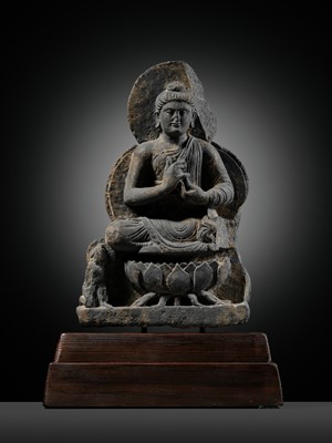 Lot 391 - A GRAY SCHIST FIGURE OF BUDDHA TEACHING HIS FIRST SERMON, ANCIENT REGION OF GANDHARA, 3RD-4TH CENTURY