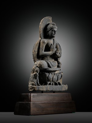 Lot 391 - A GRAY SCHIST FIGURE OF BUDDHA TEACHING HIS FIRST SERMON, ANCIENT REGION OF GANDHARA, 3RD-4TH CENTURY