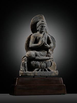 Lot 391 - A GRAY SCHIST FIGURE OF BUDDHA TEACHING HIS FIRST SERMON, ANCIENT REGION OF GANDHARA, 3RD-4TH CENTURY