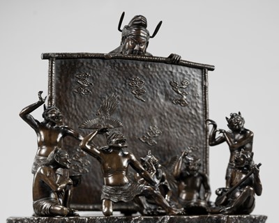 Lot 6 - AN IMPRESSIVE BRONZE OKIMONO DEPICTING SHOKI SNEAKING UP ON A GATHERING OF ONI