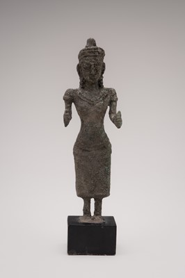 Lot 1023 - A FOLK BRONZE FIGURE OF UMA, KHMER EMPIRE, c.12TH TO 14th CENTURY