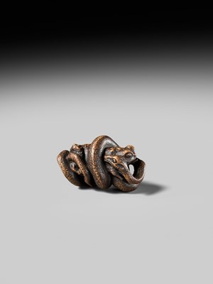 Lot 120 - MASANAO: A FINE WOOD NETSUKE OF A SNAKE PREYING ON A FROG, SANSUKUMI