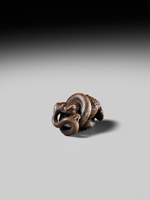 Lot 120 - MASANAO: A FINE WOOD NETSUKE OF A SNAKE PREYING ON A FROG, SANSUKUMI