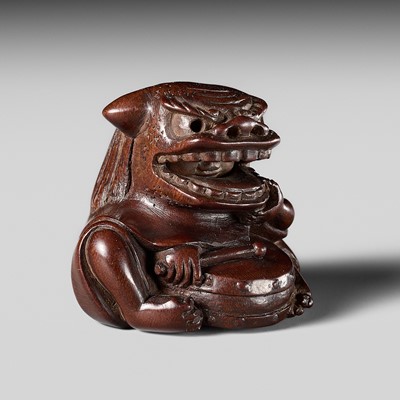 Lot 365 - MIWA KATSUSUKE: A FINE WOOD NETSUKE OF A KARAKO DRUMMER WITH SHISHIMAI MASK