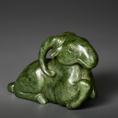 Lot 824 - A MASSIVE SPINACH GREEN JADE MODEL OF A RECUMBENT RAM, QING DYNASTY