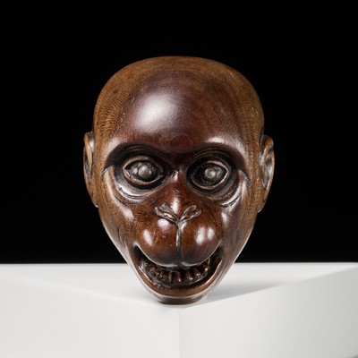 Lot 298 - DEME UMAN: A WOOD KYOGEN MASK NETSUKE OF A MONKEY