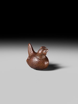 TOMOTSUNE: A SUPERB NAGOYA SCHOOL WOOD NETSUKE OF A HEN WITH TWO CHICKS