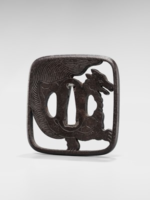 Lot 548 - AN IRON SUKASHI TSUBA OF A MINOGAME, WITH NBTHK TOKUBETSU KICHO CERTIFICATE