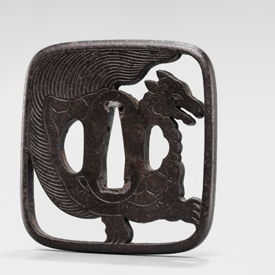Lot 548 - AN IRON SUKASHI TSUBA OF A MINOGAME, WITH NBTHK TOKUBETSU KICHO CERTIFICATE