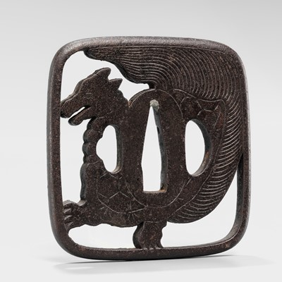 Lot 548 - AN IRON SUKASHI TSUBA OF A MINOGAME, WITH NBTHK TOKUBETSU KICHO CERTIFICATE