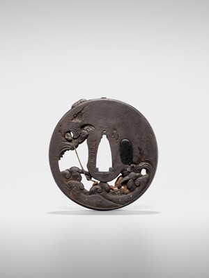 Lot 62 - AN INGENIOUS TETSUGENDO SCHOOL IRON TSUBA WITH A MONKEY CATCHING AN OCTOPUS