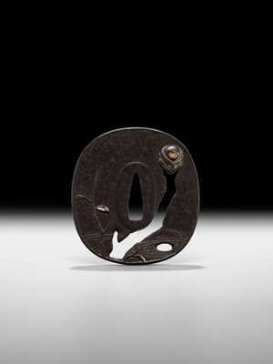 Lot 60 - AN IRON SUKASHI TSUBA WITH MONKEY, DATED 1863