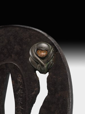 Lot 60 - AN IRON SUKASHI TSUBA WITH MONKEY, DATED 1863