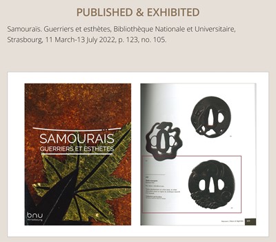 Lot 65 - A SUPERB IRON TSUBA OF A PUPPY WITH GOLD-INLAID EYES