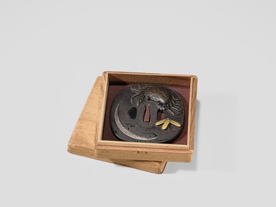 Lot 66 - A SUPERB IRON TSUBA WITH A CRAB AND THE REFLECTION OF A CRESCENT MOON