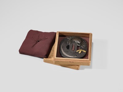 Lot 66 - A SUPERB IRON TSUBA WITH A CRAB AND THE REFLECTION OF A CRESCENT MOON