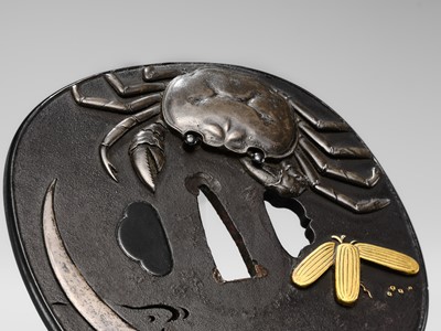 Lot 66 - A SUPERB IRON TSUBA WITH A CRAB AND THE REFLECTION OF A CRESCENT MOON