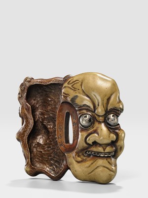 Lot 70 - SEIRYUKEN HIDENOBU: A LARGE AND SUPERB SENTOKU AND SUAKA MITO SCHOOL ‘ONI AND OBESHIMI MASK’ TSUBA