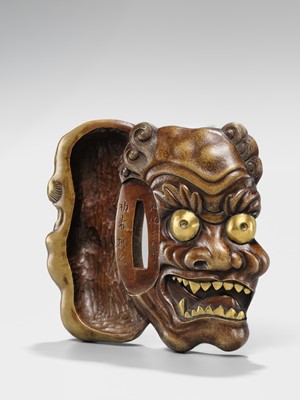 Lot 70 - SEIRYUKEN HIDENOBU: A LARGE AND SUPERB SENTOKU AND SUAKA MITO SCHOOL ‘ONI AND OBESHIMI MASK’ TSUBA