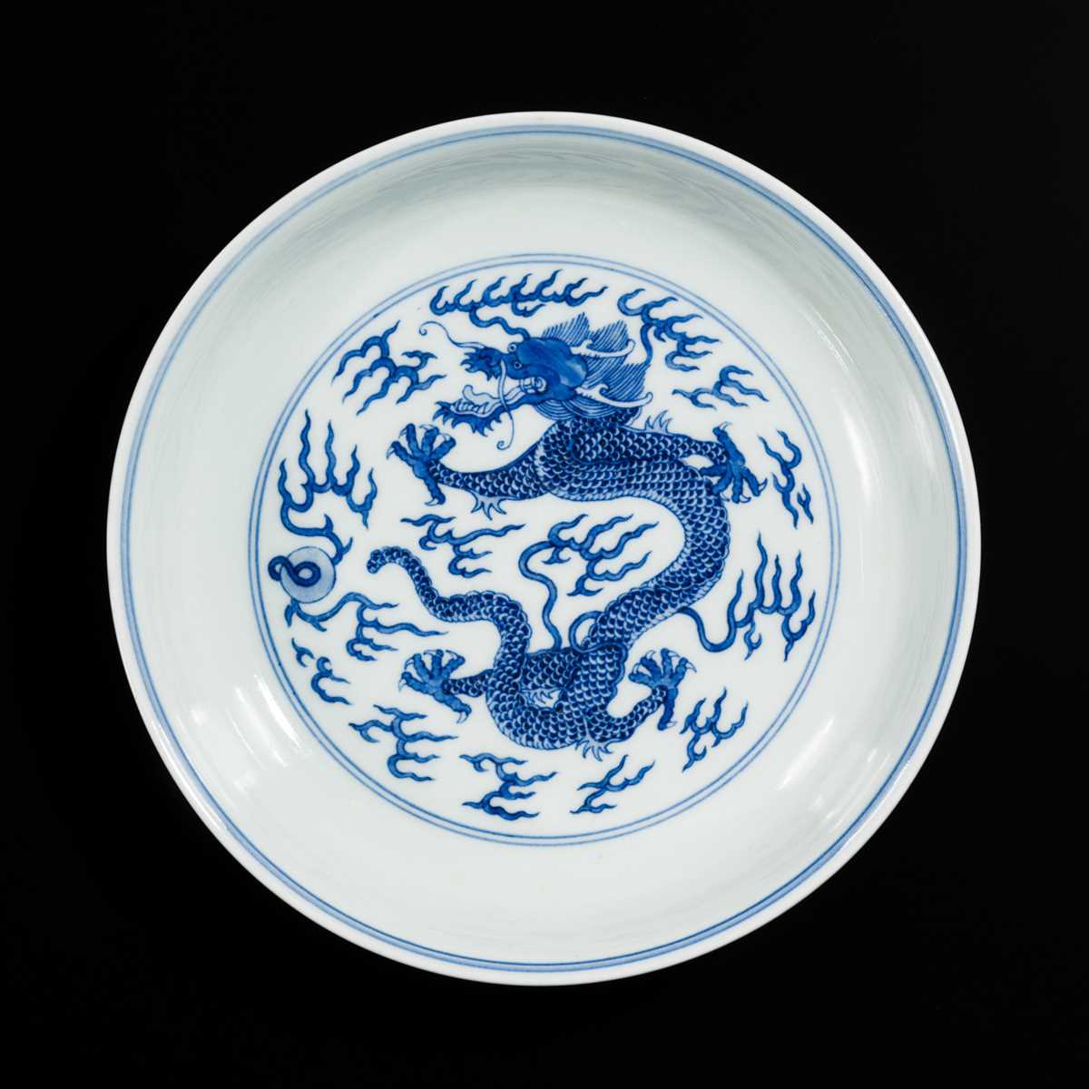 Lot 549 - AN IMPERIAL BLUE AND WHITE ‘DRAGON’ DISH, JIAQING MARK AND PERIOD