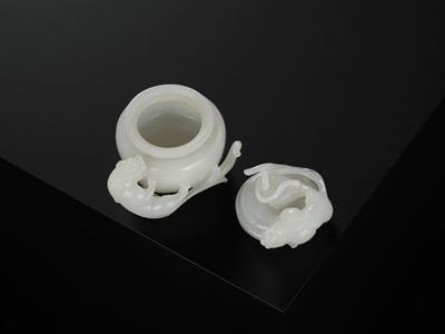 Lot 430 - A WHITE JADE ‘CHILONG’ OPENWORK WATER POT AND COVER, QING DYNASTY