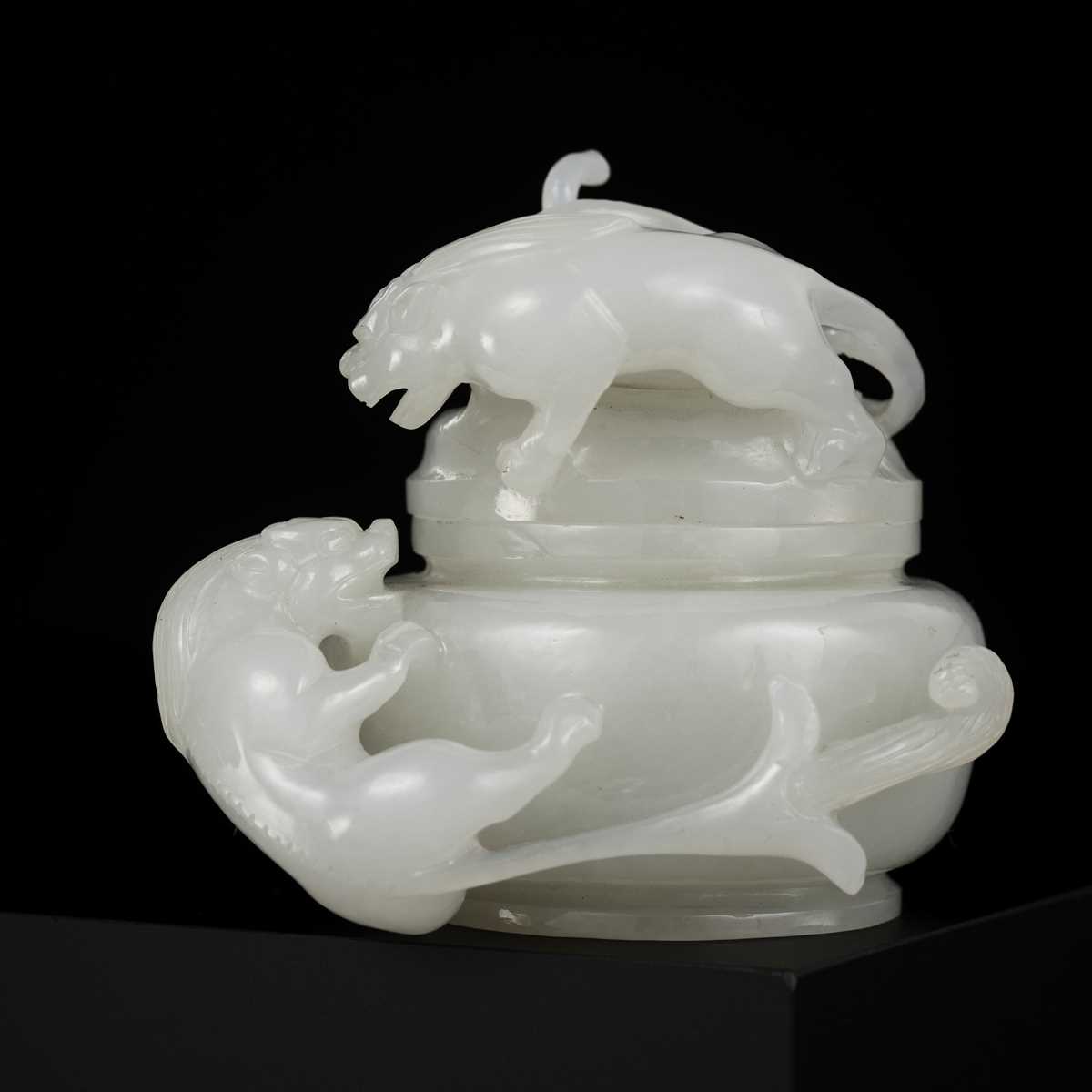 Lot 430 - A WHITE JADE ‘CHILONG’ OPENWORK WATER POT AND COVER, QING DYNASTY