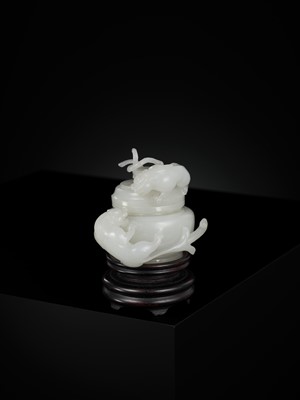 Lot 430 - A WHITE JADE ‘CHILONG’ OPENWORK WATER POT AND COVER, QING DYNASTY