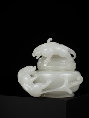 Lot 430 - A WHITE JADE ‘CHILONG’ OPENWORK WATER POT AND COVER, QING DYNASTY