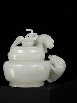 Lot 430 - A WHITE JADE ‘CHILONG’ OPENWORK WATER POT AND COVER, QING DYNASTY