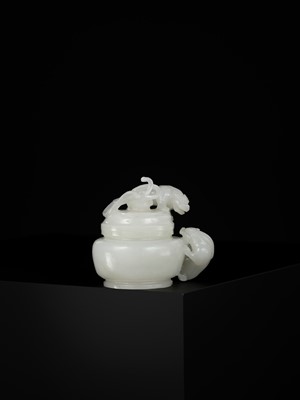 Lot 430 - A WHITE JADE ‘CHILONG’ OPENWORK WATER POT AND COVER, QING DYNASTY