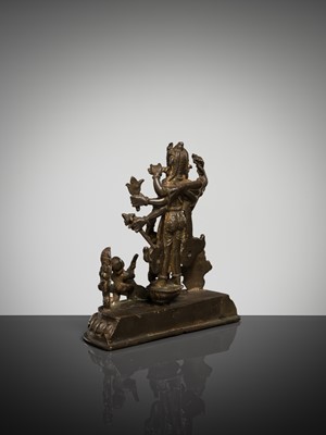 Lot 307 - A BRONZE GROUP OF AMOGHAPASA LOKESHVARA WITH GANESHA, TARA, AND ATTENDANTS, NEPAL OR HIMACHAL PRADESH, 18TH-19TH CENTURY