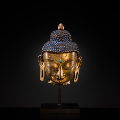 Lot 12 - A SILVER AND COPPER-INLAID GILT-BRONZE HEAD OF BUDDHA, 17TH CENTURY